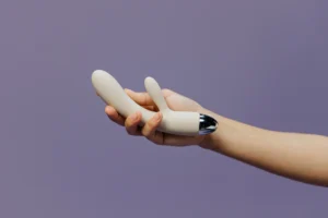 Girl holding sex toy to break the sex toy myths