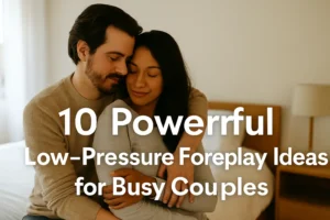 Loving couple sharing an intimate embrace in a cozy bedroom, representing low pressure foreplay ideas for busy couples