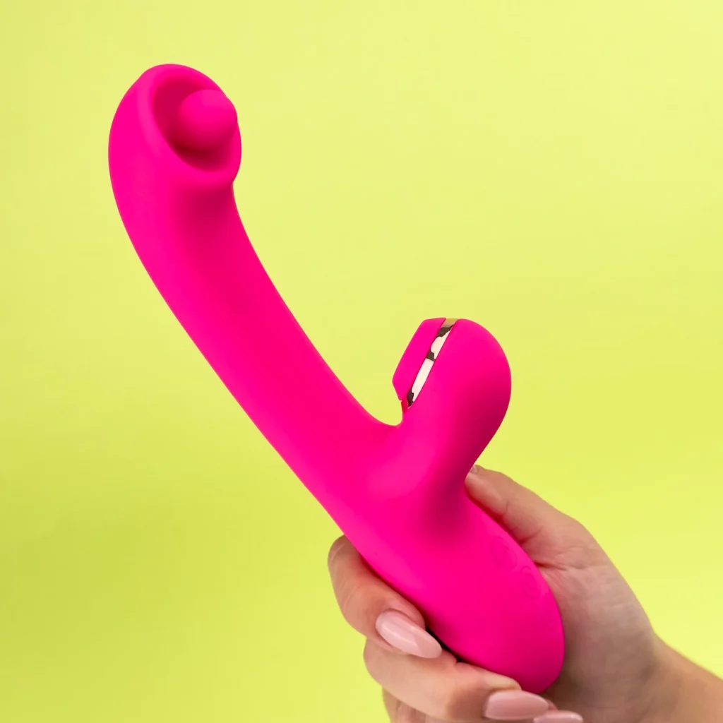 Women holding orbis clit sucking rabbit toy