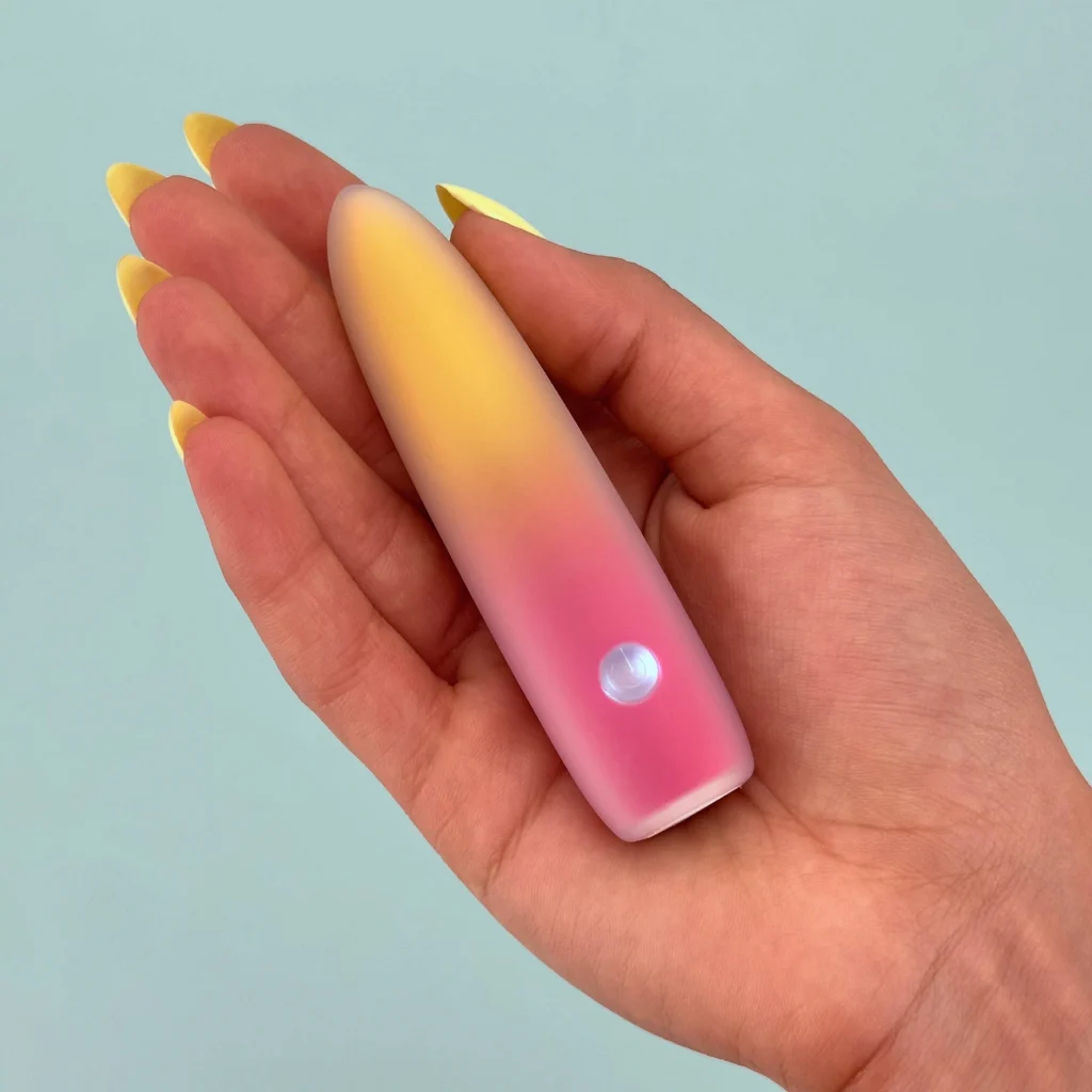 Girl holding Sunset pal bullet vibrator
